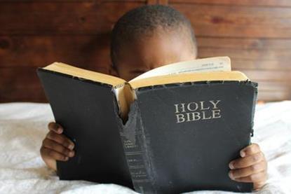 Kid-Reading-Bible-Main_article_image.jpg
