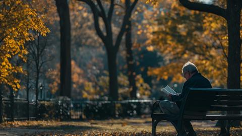 Solitary Reader in Autumn Park